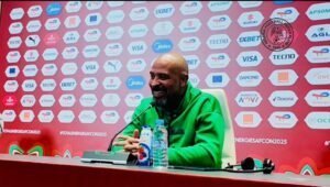 Alt Text: A detailed cross-section diagram of a house foundation showing concrete footings, insulation, and a vapor barrie...