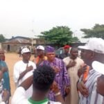 Alt Text: A detailed cross-section diagram of a house foundation showing concrete footings, insulation, and a vapor barrie...