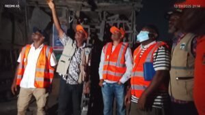 Alt Text: A detailed cross-section diagram of a house foundation showing concrete footings, insulation, and a vapor barrie...